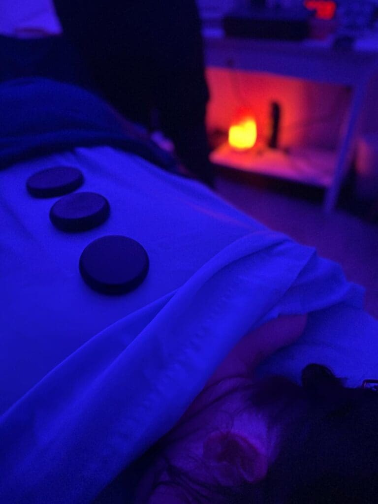 Hot stones during a massage at Mountaineer Massage & Bodyworks